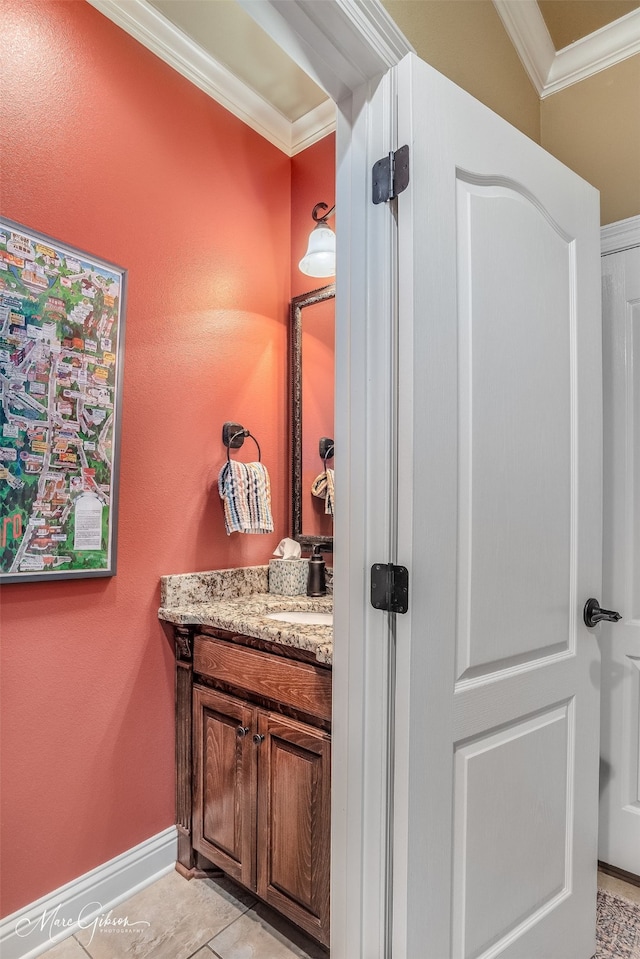 bathroom with vanity, ornamental molding, and vaulted ceiling