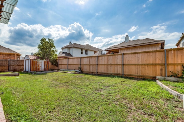 view of yard with a storage shed