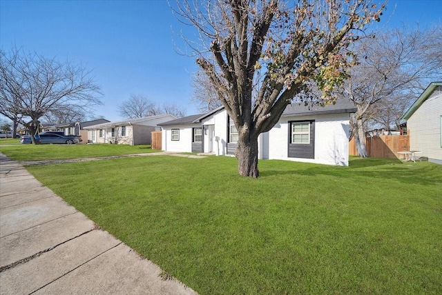 view of front of house with a front lawn