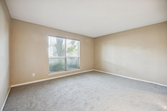 9728 Amberton Pkwy, Dallas, TX 75243 - carpeted empty room with baseboards