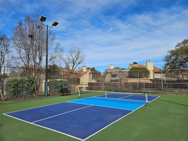 9728 Amberton Pkwy, Dallas, TX 75243 - view of tennis court featuring community basketball court