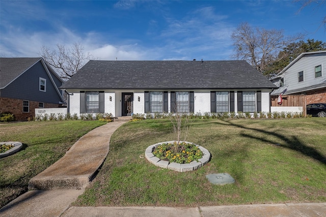 view of front facade with a front yard