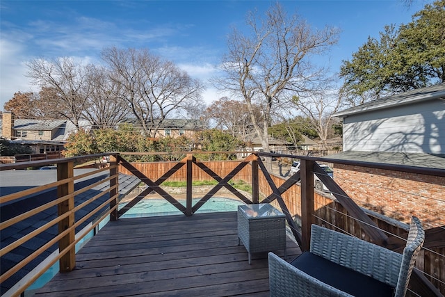 deck with a swimming pool