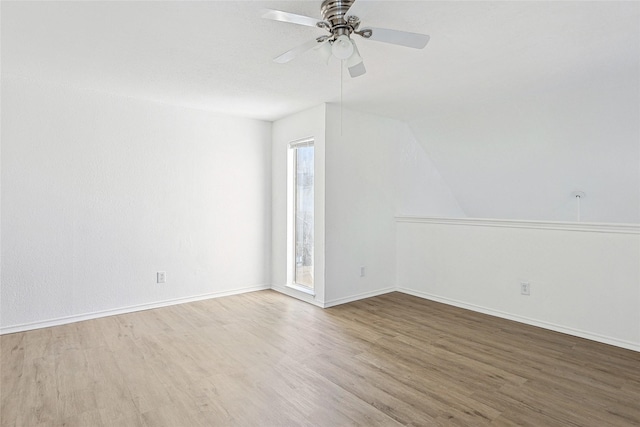 unfurnished room featuring ceiling fan and wood-type flooring