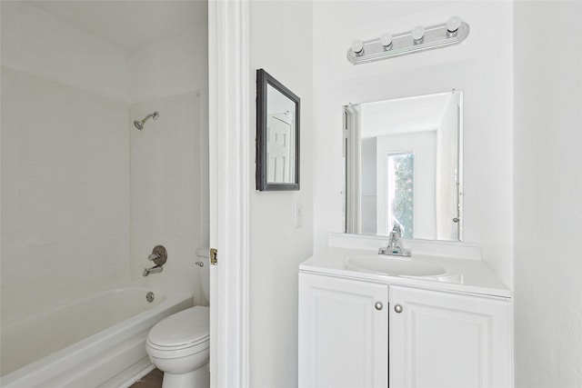 full bathroom with vanity, toilet, and tiled shower / bath