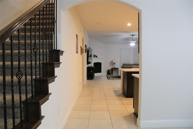 corridor with light tile patterned flooring