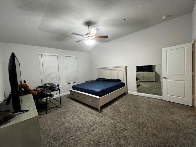 bedroom featuring a textured ceiling, ceiling fan, vaulted ceiling, and dark colored carpet