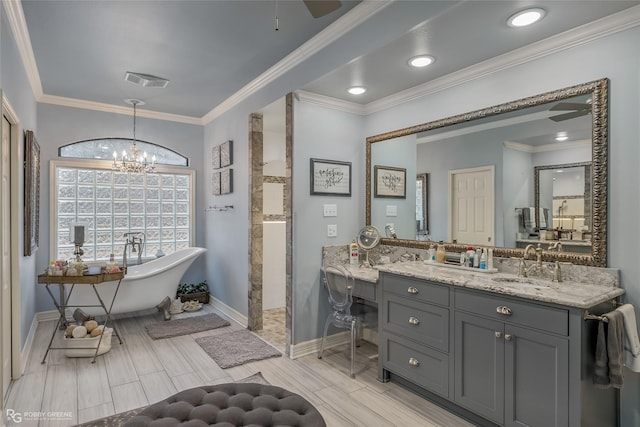 bathroom featuring crown molding, vanity, separate shower and tub, and an inviting chandelier