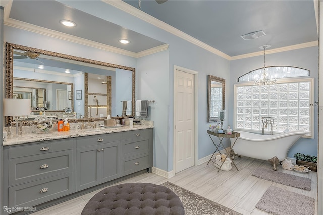 bathroom featuring ceiling fan with notable chandelier, vanity, crown molding, and plus walk in shower