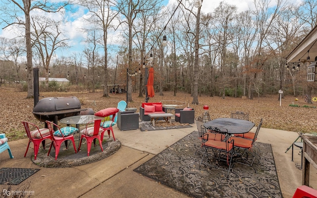 view of patio / terrace featuring outdoor lounge area and area for grilling