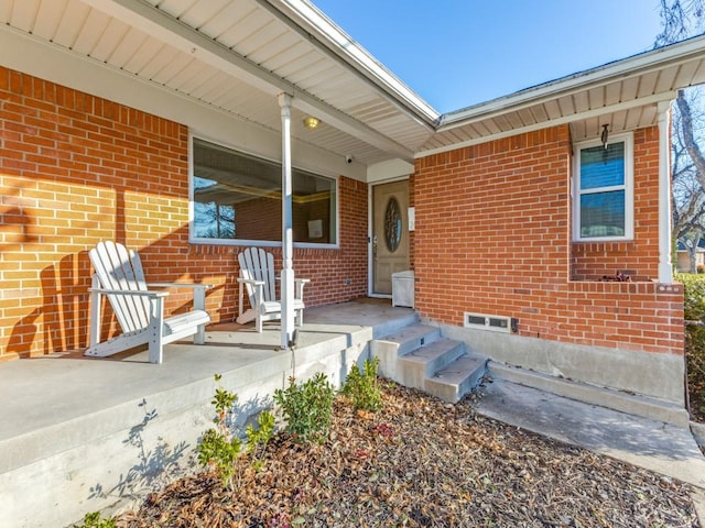 doorway to property with covered porch