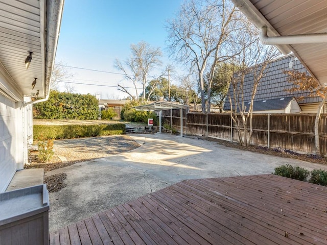 wooden deck with a patio area