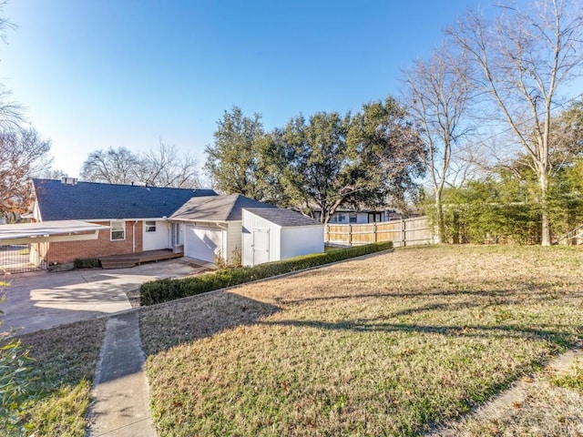 view of yard with a garage