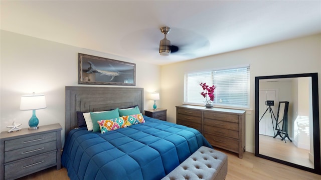 bedroom featuring ceiling fan and light hardwood / wood-style floors