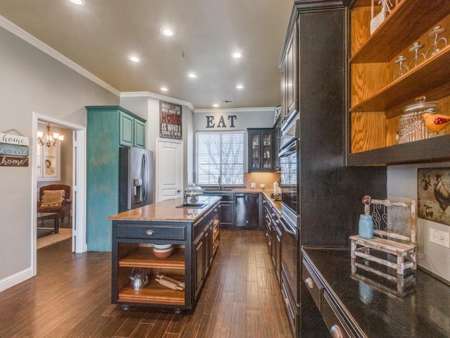 kitchen with sink, stainless steel refrigerator with ice dispenser, ornamental molding, a kitchen island, and dark hardwood / wood-style flooring