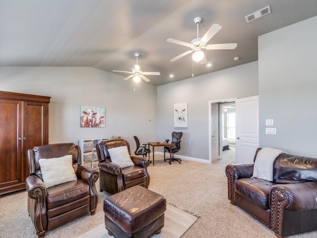 living room with light carpet, ceiling fan, and lofted ceiling