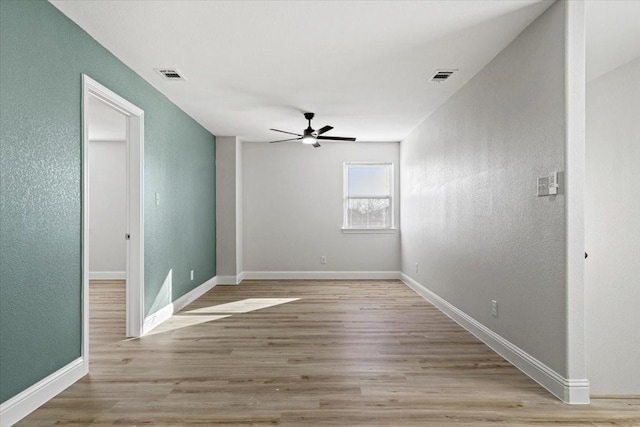 6305 Pebble Ave, Dallas, TX 75217 - empty room featuring ceiling fan and light wood-type flooring