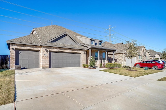 view of front facade with a garage and a front lawn