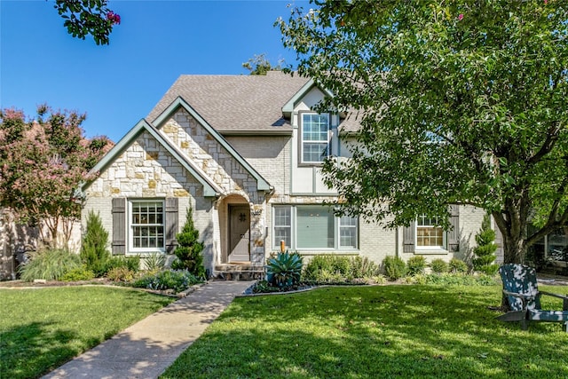 view of front of home with a front lawn