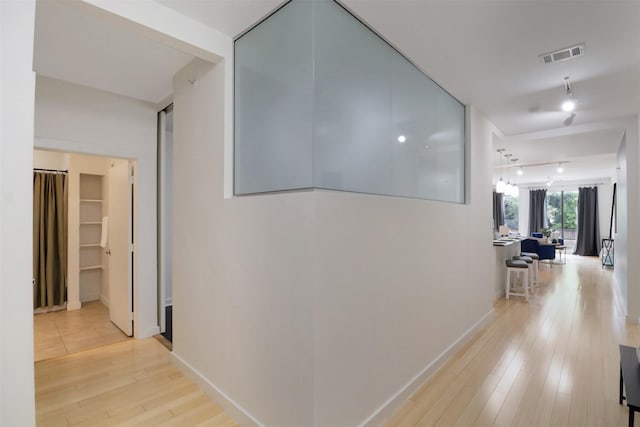 hall featuring light hardwood / wood-style floors