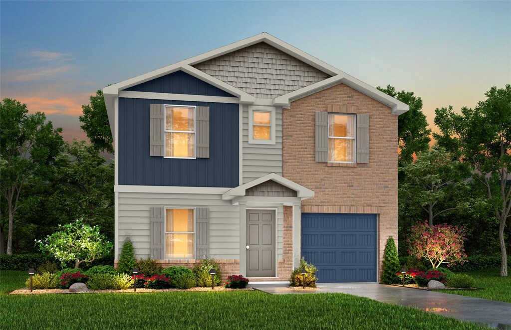 2018 Medora St, Graham, TX 76040 - view of front of property featuring a garage