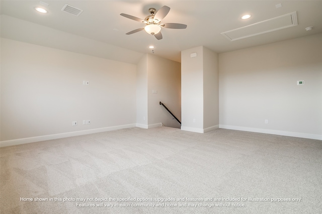 unfurnished room featuring recessed lighting, visible vents, attic access, light carpet, and ceiling fan