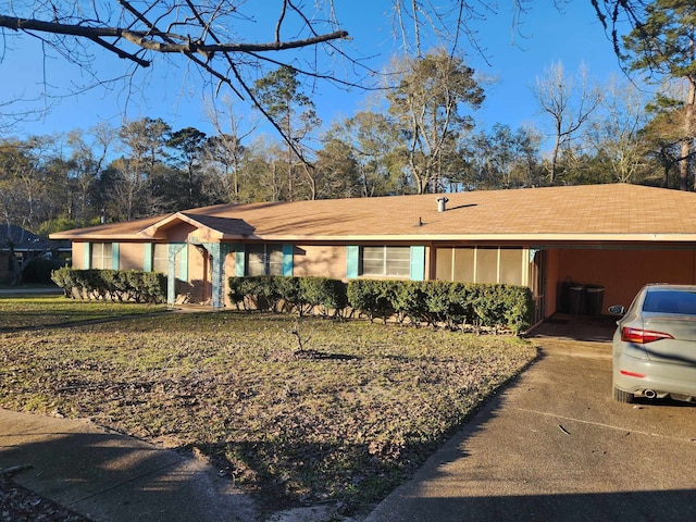 single story home with a garage