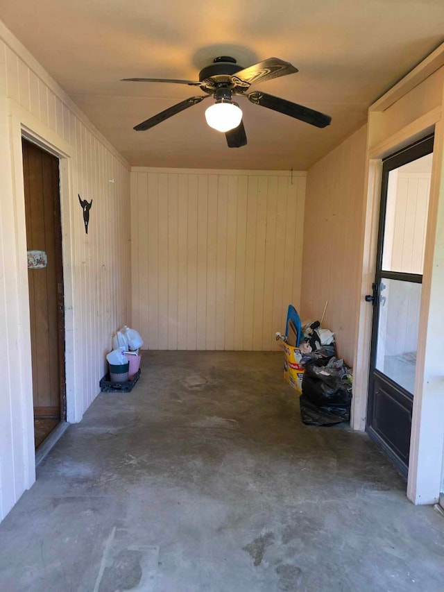 exterior space with a ceiling fan