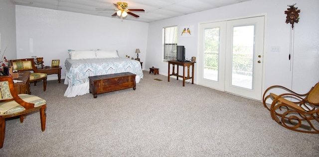 carpeted bedroom featuring ceiling fan and access to exterior