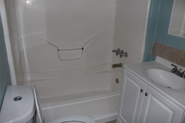 full bathroom with vanity, bathing tub / shower combination, and toilet