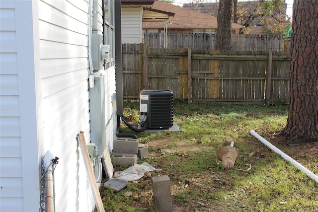 view of yard with central AC