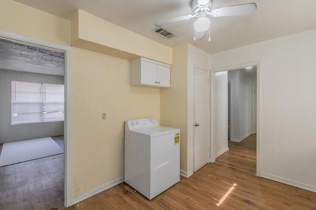 washroom featuring hardwood / wood-style floors, ceiling fan, and washer / clothes dryer