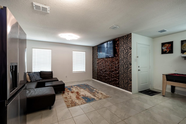 interior space with a textured ceiling