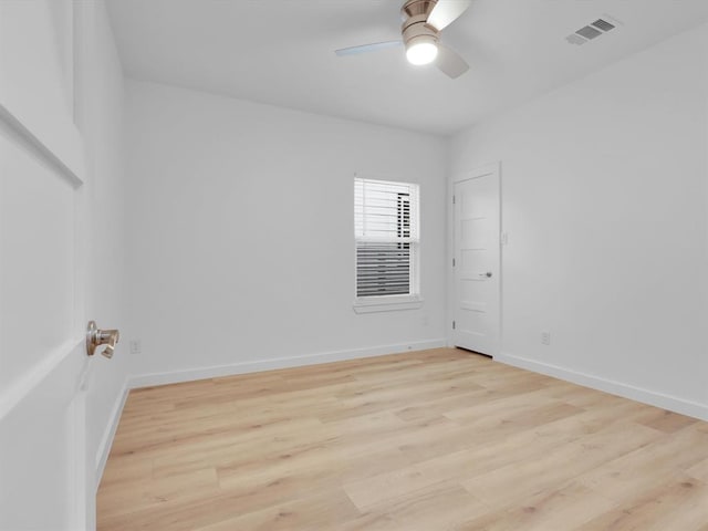 unfurnished room featuring ceiling fan and light hardwood / wood-style flooring