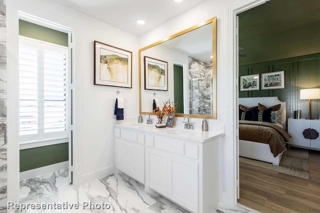 bathroom featuring vanity and walk in shower