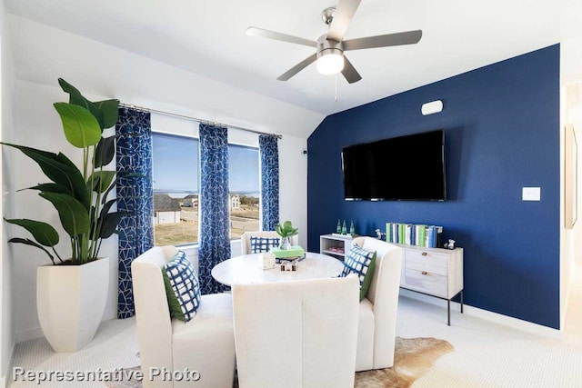 dining space featuring vaulted ceiling and ceiling fan