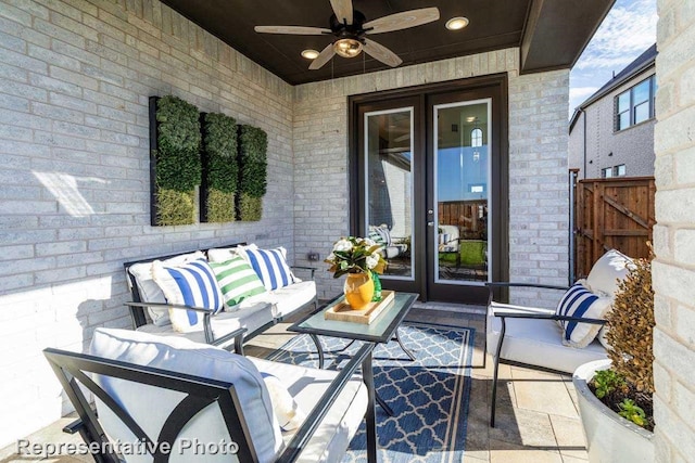 view of patio with ceiling fan and an outdoor hangout area