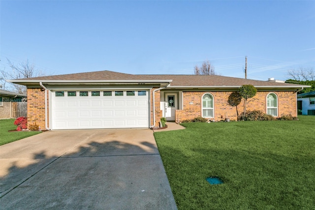 ranch-style house with a garage and a front yard