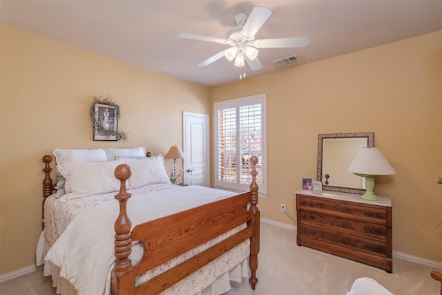 bedroom featuring baseboards, visible vents, ceiling fan, and carpet flooring