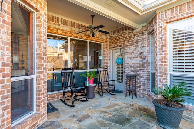 view of patio with a ceiling fan