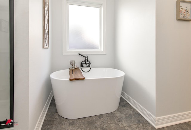 bathroom featuring a bathing tub