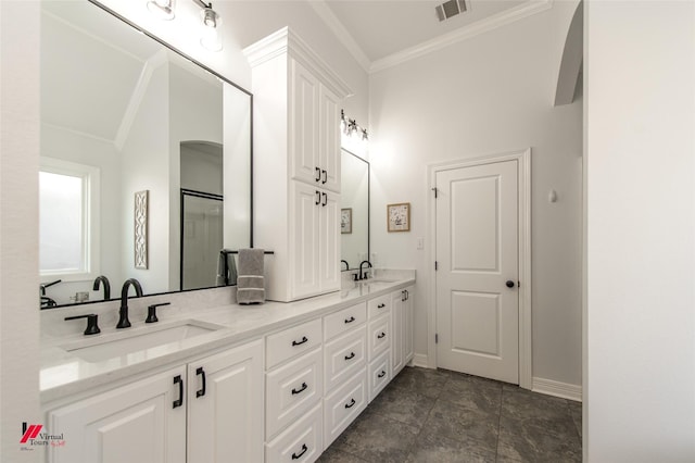 bathroom with vanity and crown molding