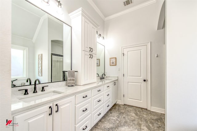 bathroom with vanity and ornamental molding