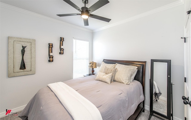 bedroom with carpet, ceiling fan, and crown molding