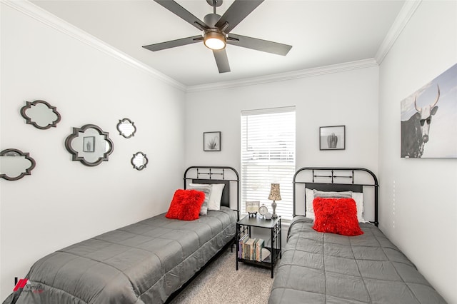 carpeted bedroom with ceiling fan and crown molding