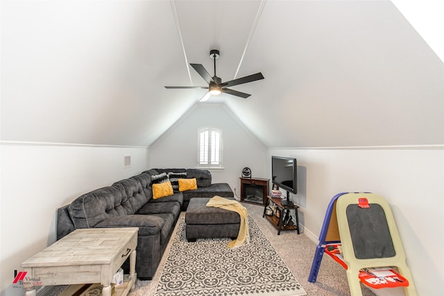 living room featuring light colored carpet, vaulted ceiling, and ceiling fan