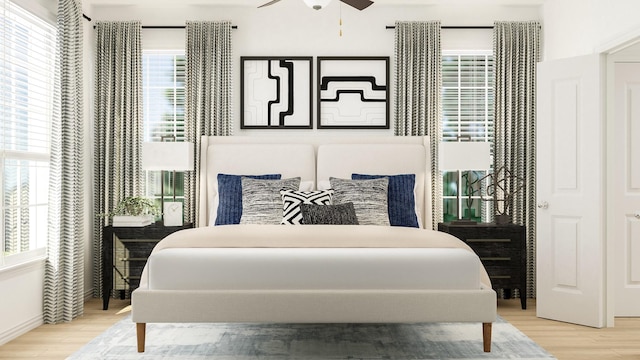 bedroom featuring hardwood / wood-style floors and ceiling fan