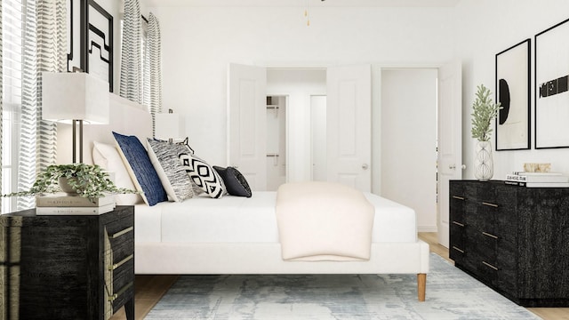 bedroom with wood-type flooring