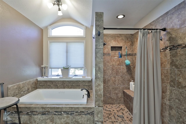 bathroom with independent shower and bath and vaulted ceiling