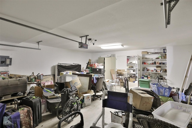 garage with electric panel and a garage door opener